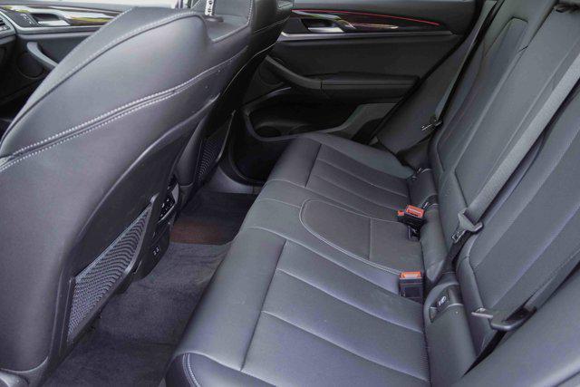 Photo of 2025 AVENTURINE RED BMW X4