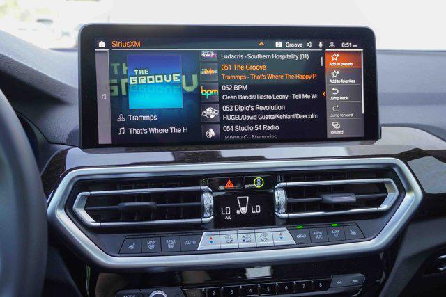Photo of 2025 AVENTURINE RED BMW X4