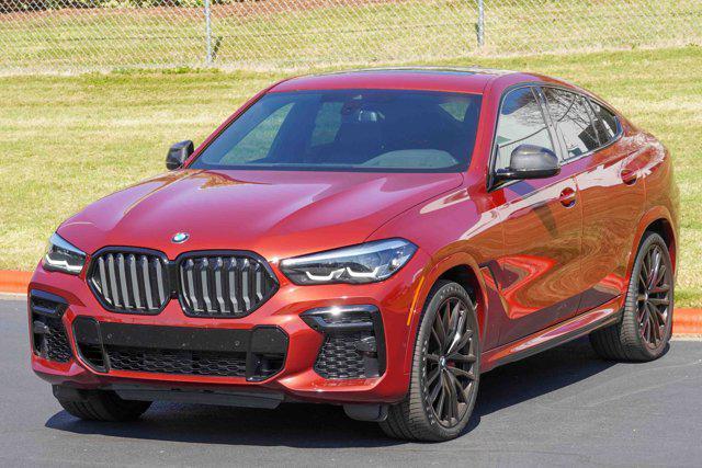 Photo of 2023 Flamenco Red Metallic BMW X6