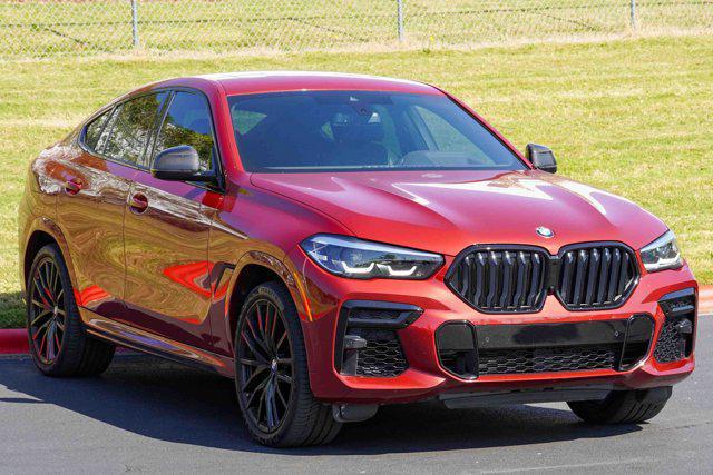 Photo of 2023 Flamenco Red Metallic BMW X6