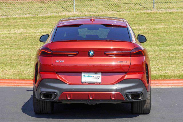 Photo of 2023 Flamenco Red Metallic BMW X6