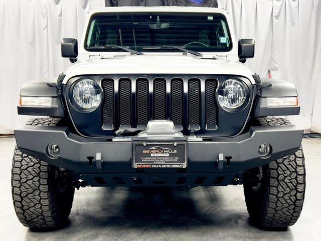 Photo of 2021 White Jeep Wrangler Unlimited