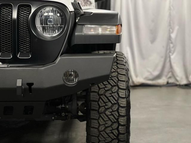 Photo of 2021 White Jeep Wrangler Unlimited