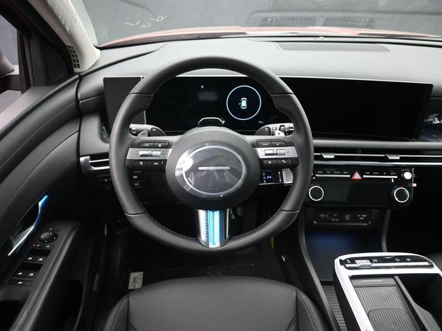 Photo of 2025 Red Hyundai TUCSON Hybrid