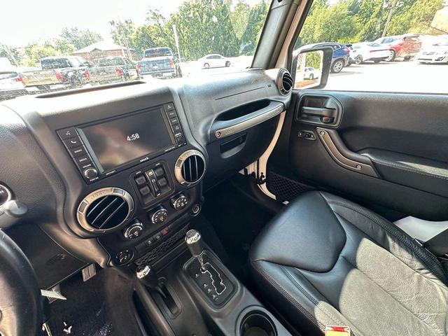 Photo of 2018 Bright White Clearcoat Jeep Wrangler JK Unlimited