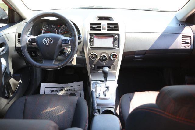 Photo of 2013 Orange Toyota Corolla