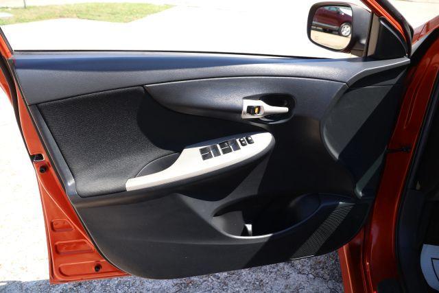 Photo of 2013 Orange Toyota Corolla