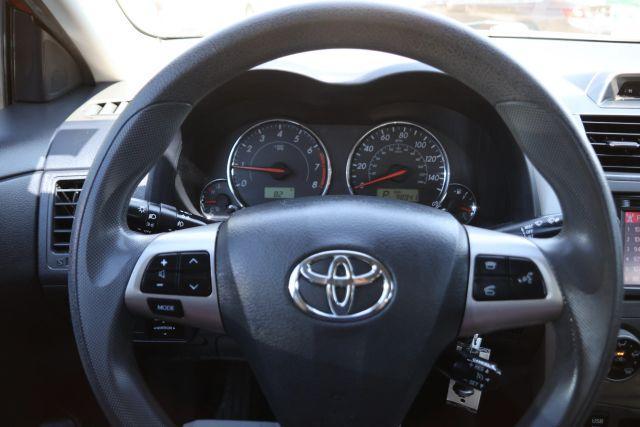 Photo of 2013 Orange Toyota Corolla