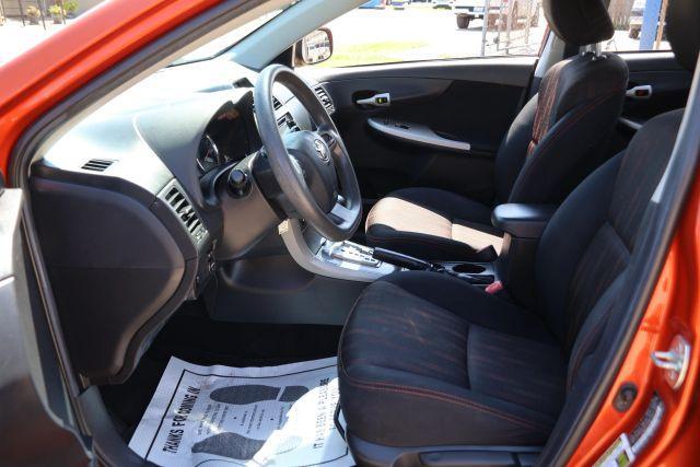 Photo of 2013 Orange Toyota Corolla