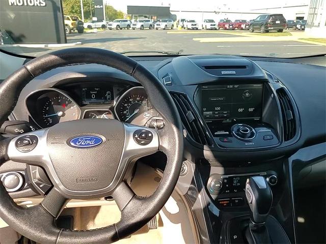 Photo of 2015 Tuxedo Black Ford Escape