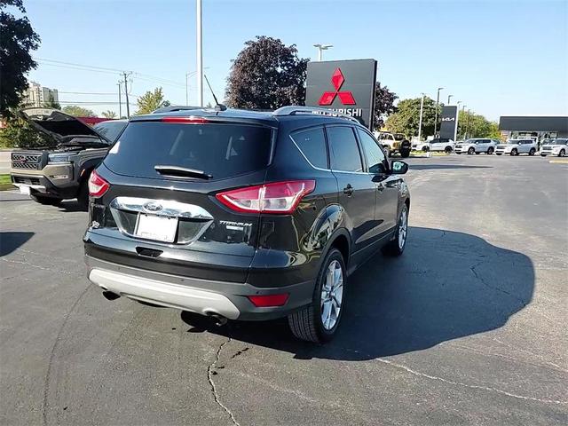 Photo of 2015 Tuxedo Black Ford Escape