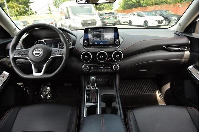 Photo of 2024 Aspen White Tricoat Nissan Sentra