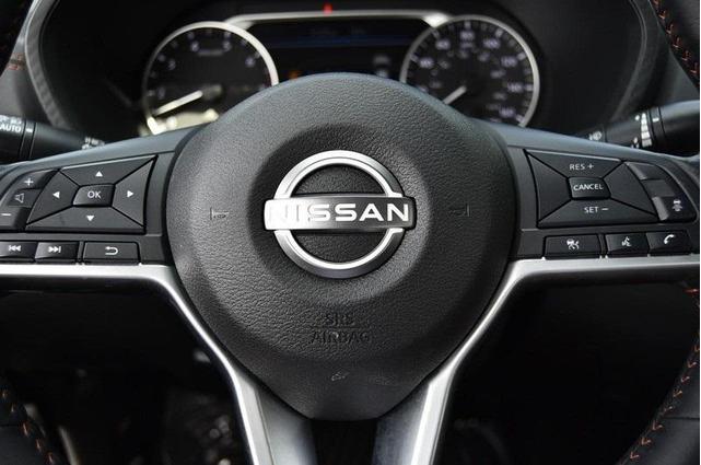 Photo of 2024 Aspen White Tricoat Nissan Sentra