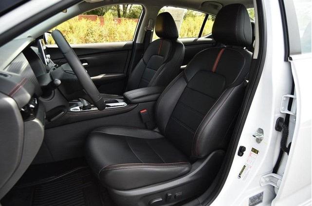 Photo of 2024 Aspen White Tricoat Nissan Sentra