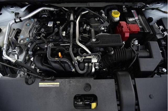 Photo of 2024 Aspen White Tricoat Nissan Sentra