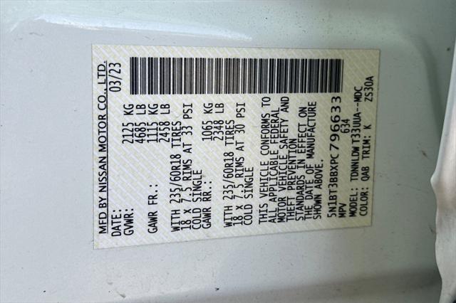 Photo of 2023 Pearl White Tricoat Nissan Rogue