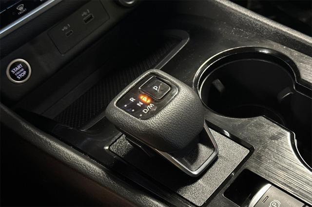 Photo of 2023 Pearl White Tricoat Nissan Rogue