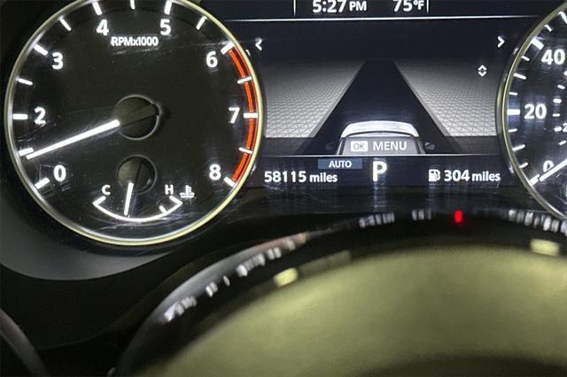 Photo of 2023 Pearl White Tricoat Nissan Rogue