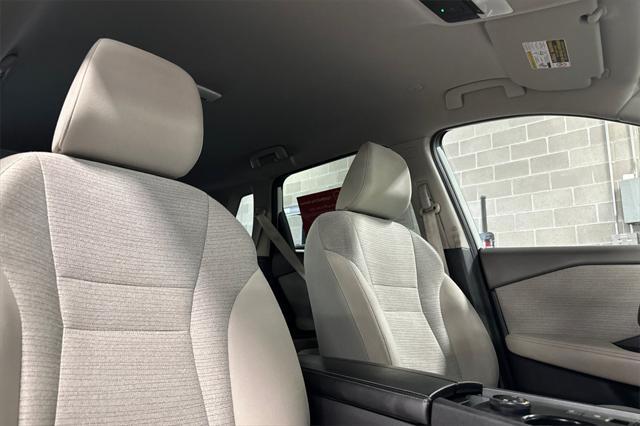 Photo of 2023 Pearl White Tricoat Nissan Rogue