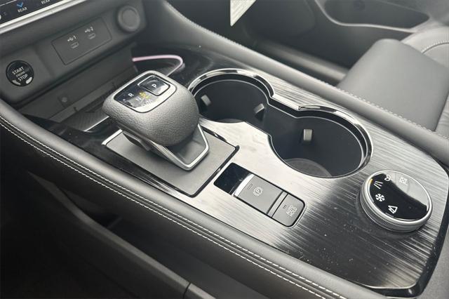 Photo of 2025 Champagne Silver Metallic Nissan Rogue