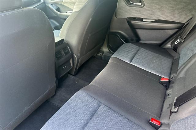 Photo of 2023 Pearl White Tricoat Nissan Rogue