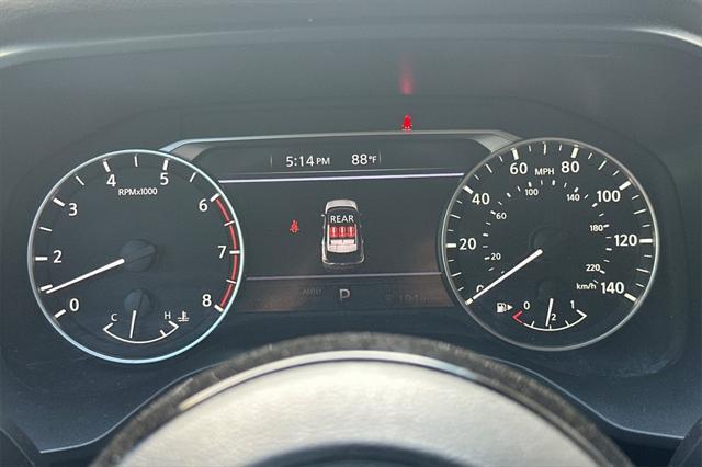 Photo of 2023 Pearl White Tricoat Nissan Rogue