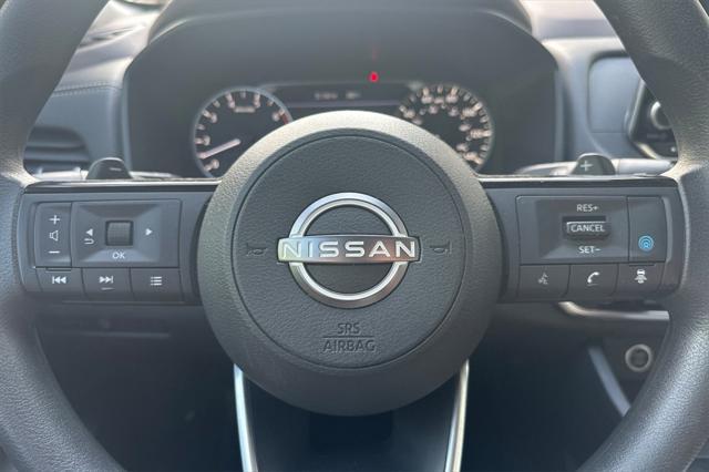 Photo of 2023 Pearl White Tricoat Nissan Rogue