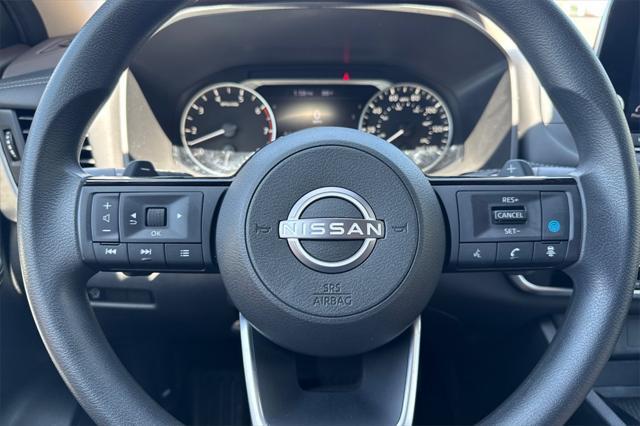 Photo of 2023 Pearl White Tricoat Nissan Rogue