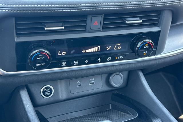 Photo of 2023 Pearl White Tricoat Nissan Rogue