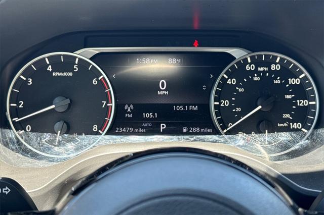 Photo of 2023 Pearl White Tricoat Nissan Rogue