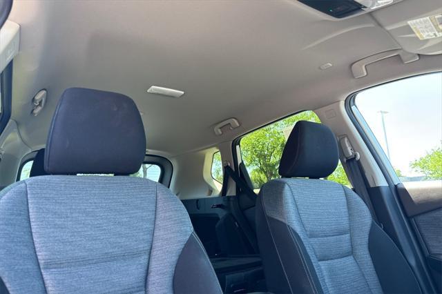 Photo of 2023 Pearl White Tricoat Nissan Rogue