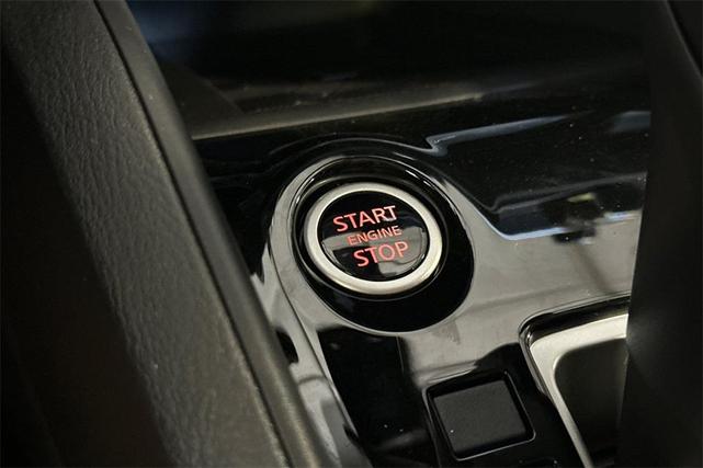 Photo of 2025 Aspen White Tricoat Nissan Versa