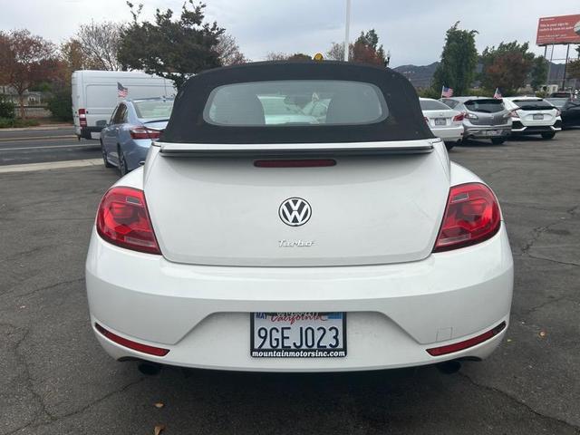 Photo of 2014 White Volkswagen Beetle