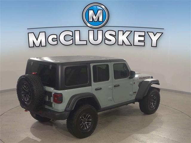 Photo of 2024 Earl Clearcoat Jeep Wrangler