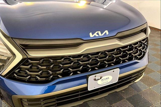 Photo of 2023 Sapphire Blue Kia Sportage