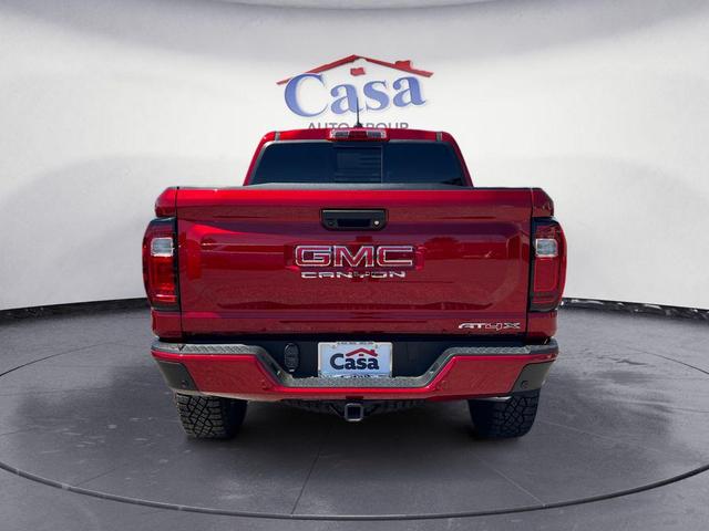 Photo of 2024 Volcanic Red Tintcoat GMC Canyon