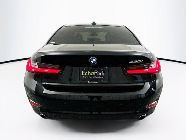 Photo of 2021 Jet Black BMW 330