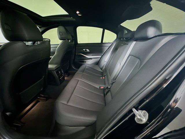 Photo of 2021 Jet Black BMW 330
