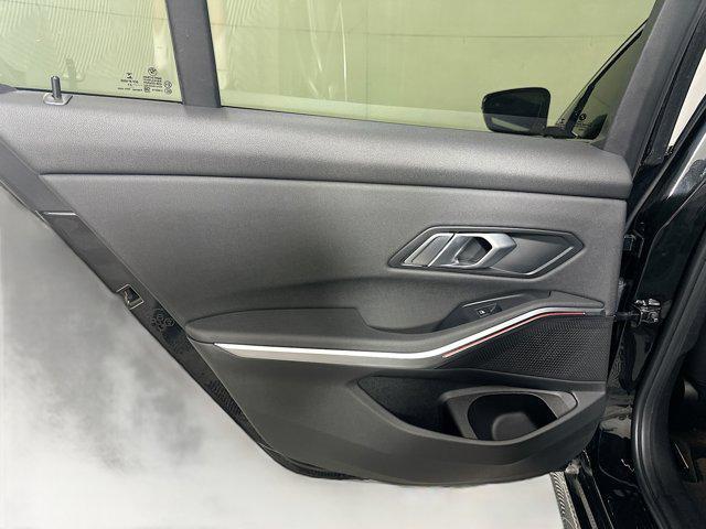 Photo of 2021 Jet Black BMW 330