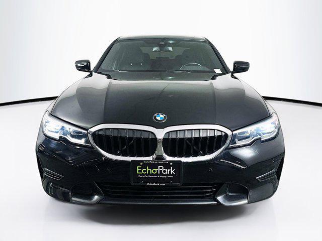 Photo of 2021 Jet Black BMW 330