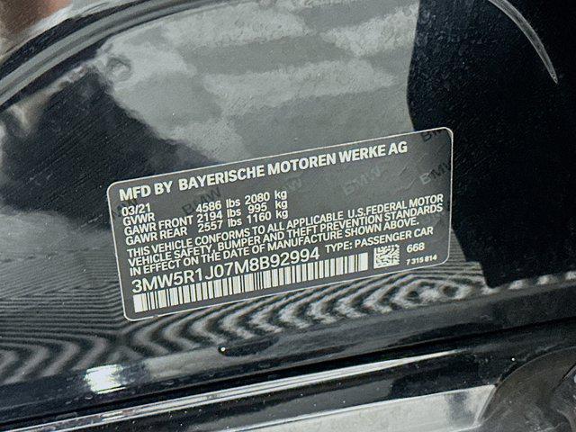 Photo of 2021 Jet Black BMW 330