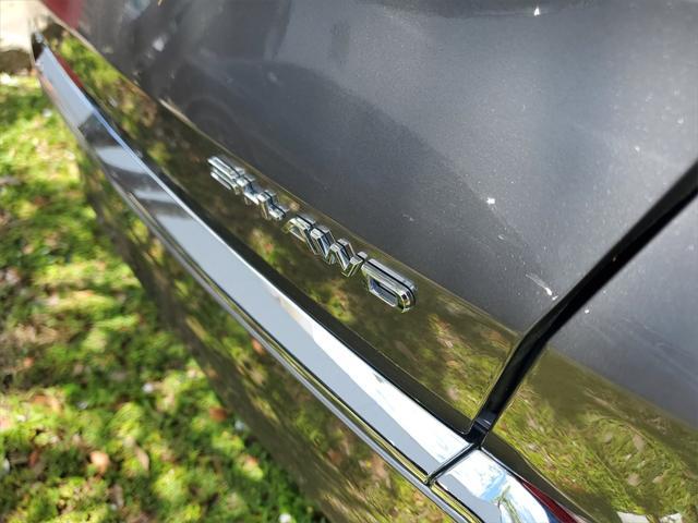 Photo of 2025 Liquid Carbon Metallic Acura MDX