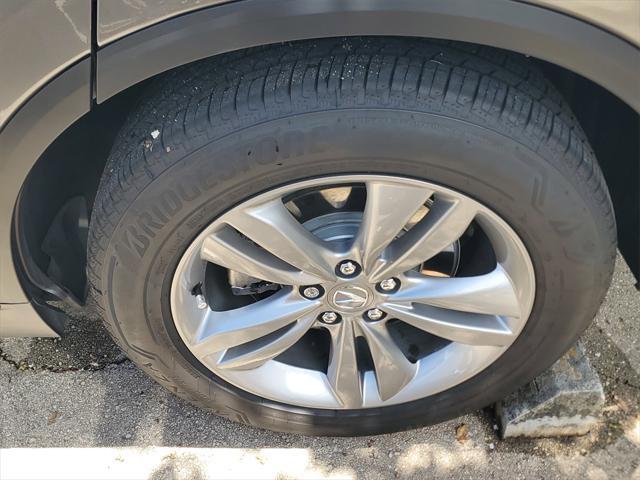 Photo of 2025 Liquid Carbon Metallic Acura MDX