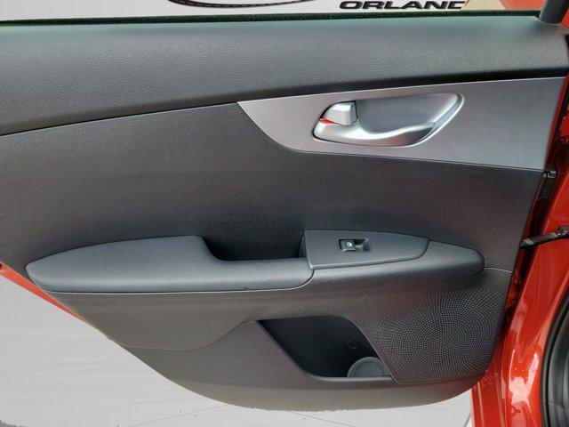 Photo of 2022 Fire Orange Kia Forte