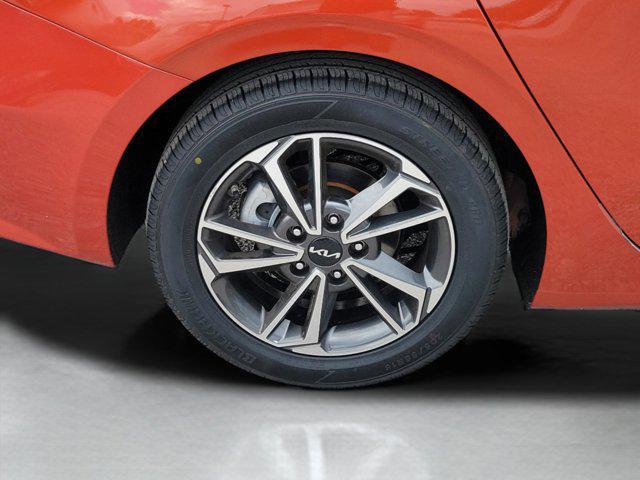 Photo of 2022 Fire Orange Kia Forte