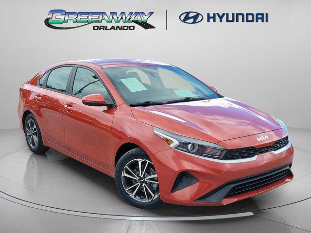 Photo of 2022 Fire Orange Kia Forte
