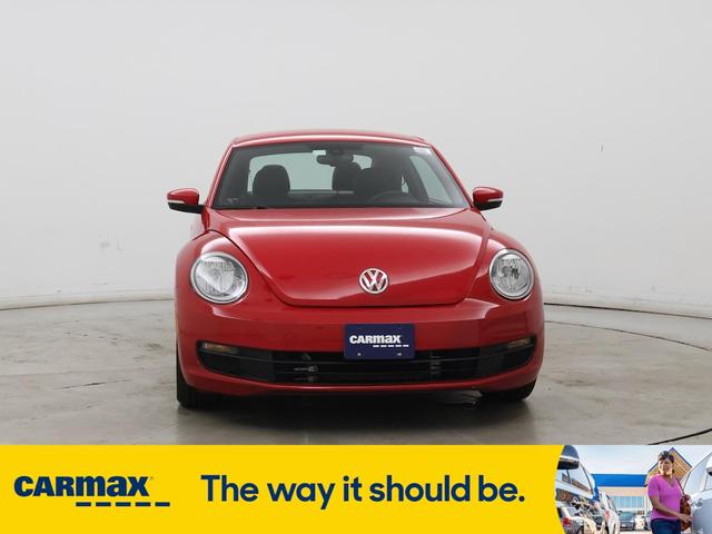 Photo of 2016 Red Volkswagen Beetle