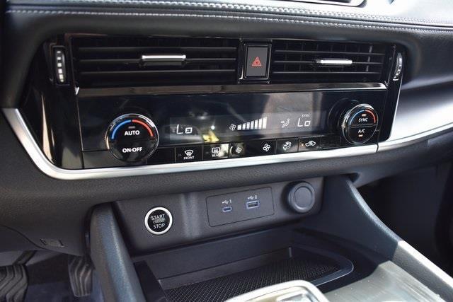Photo of 2022 Scarlet Ember Tintcoat Nissan Rogue
