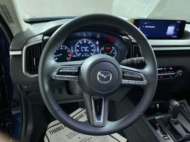 Photo of 2025 Ingot Blue Metallic Mazda CX-50