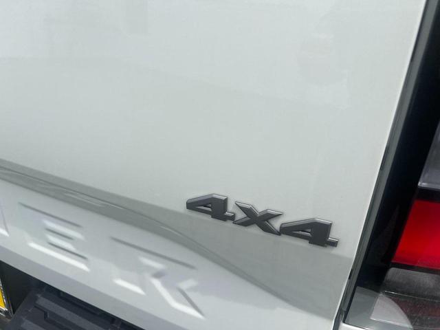 Photo of 2025 Glacier White Nissan Frontier